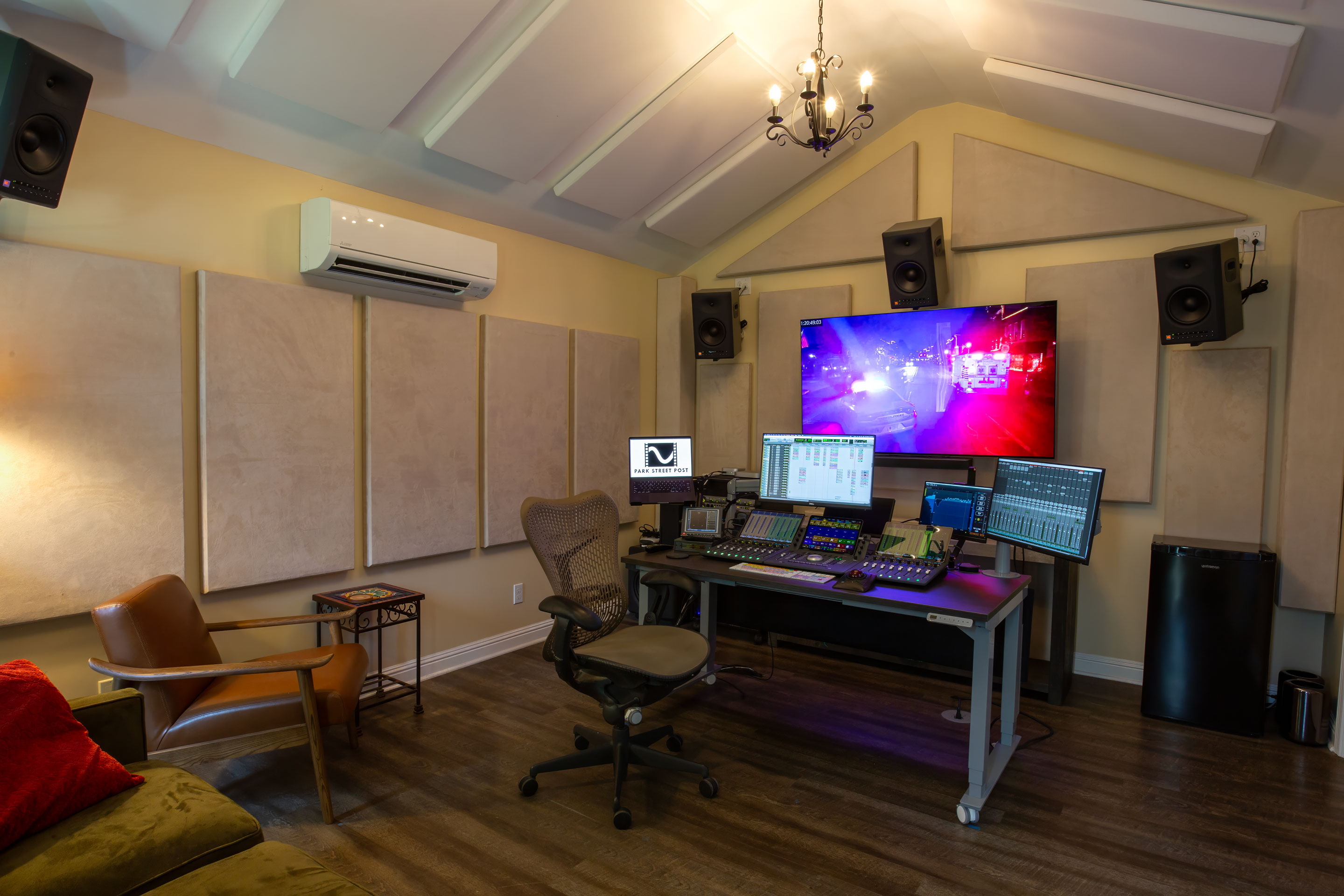 The Park Street Post mix room: Avid S1 control surface, twin reference monitors, 5.1 and 7.1 monitoring, and a 4K screen lit at the front of the room.